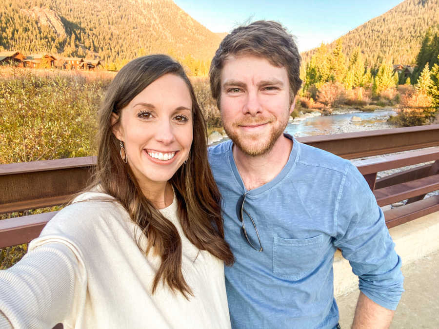 couple together by a river