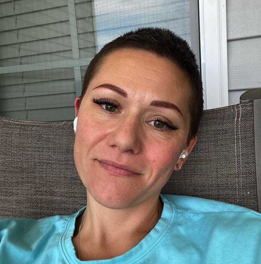 Woman smiling with airpods