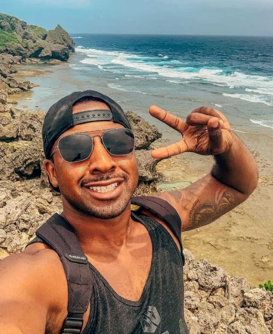 Military guy takes a selfie on a beach in Japan