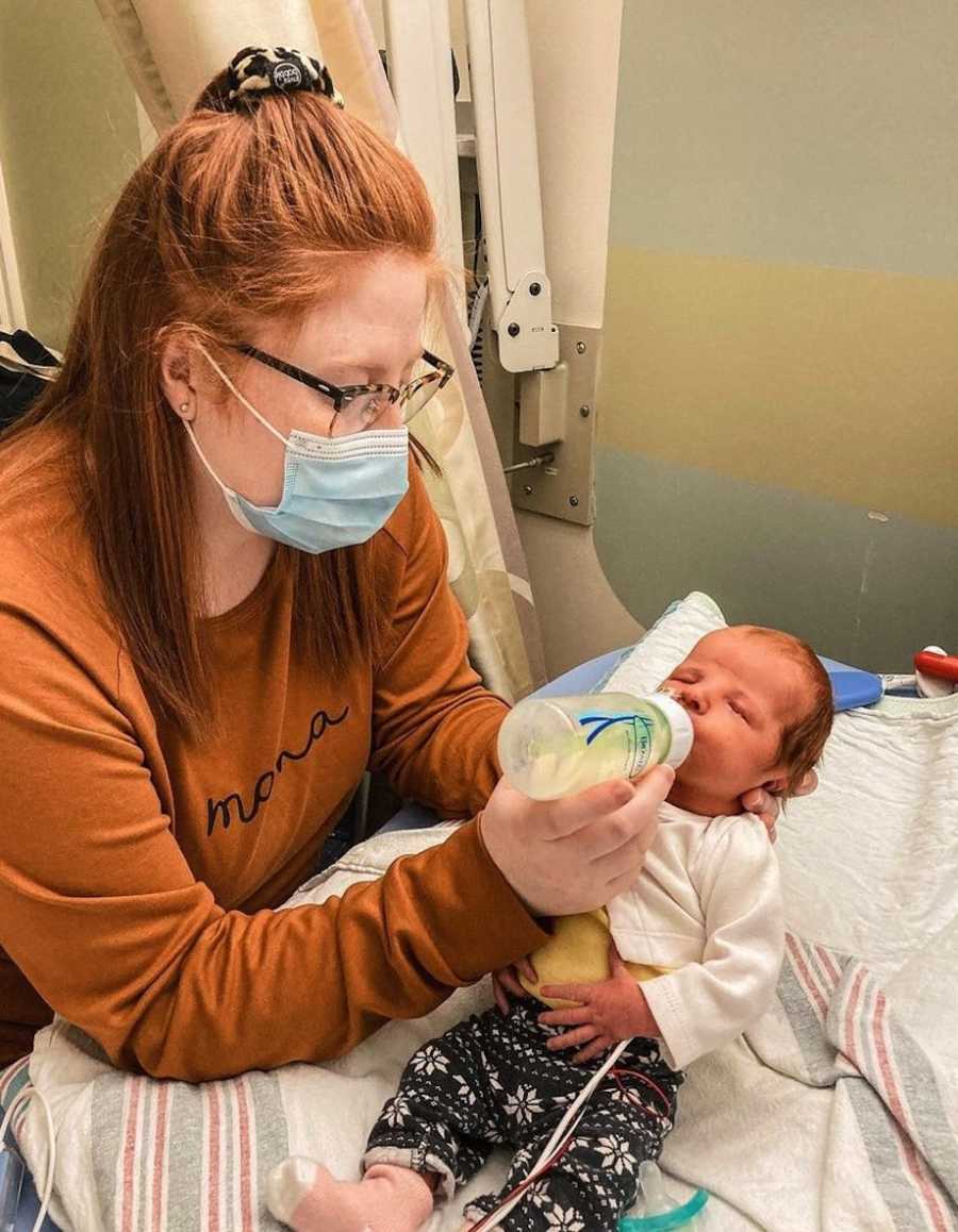 Mom feeding newborn