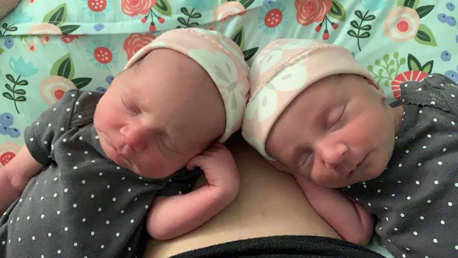 newborn twin girls sleeping