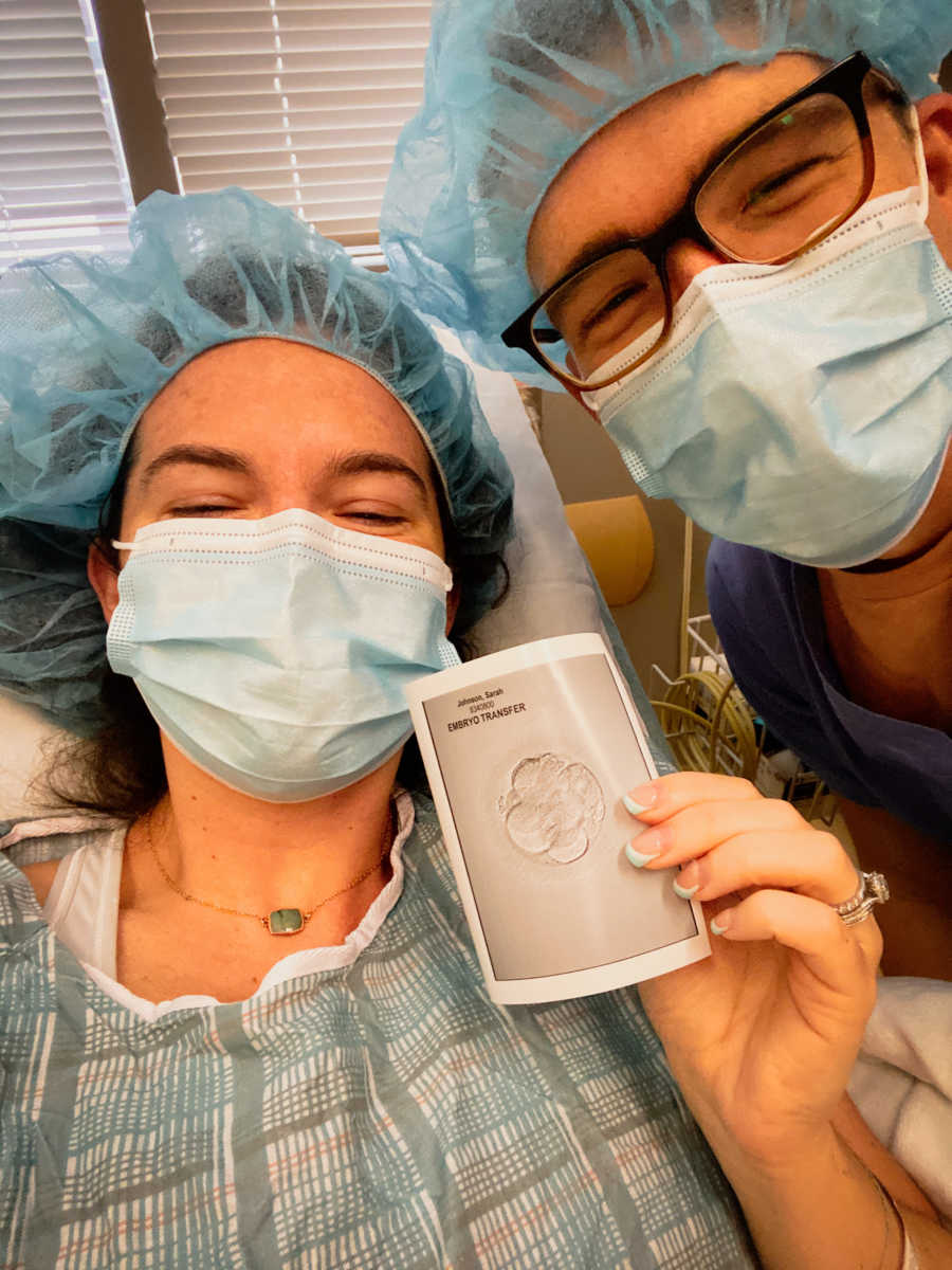 couple watching embryo transfer