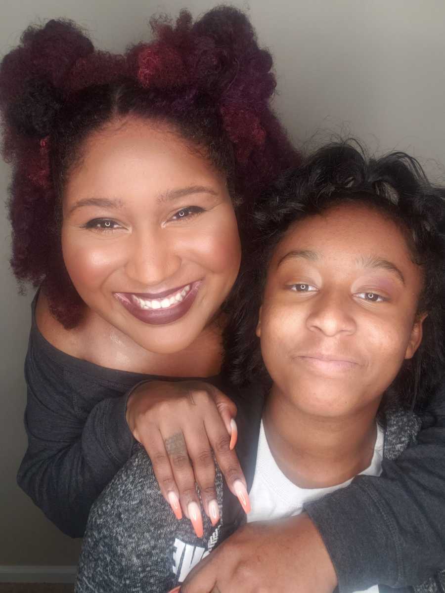 mother and daughter smiling