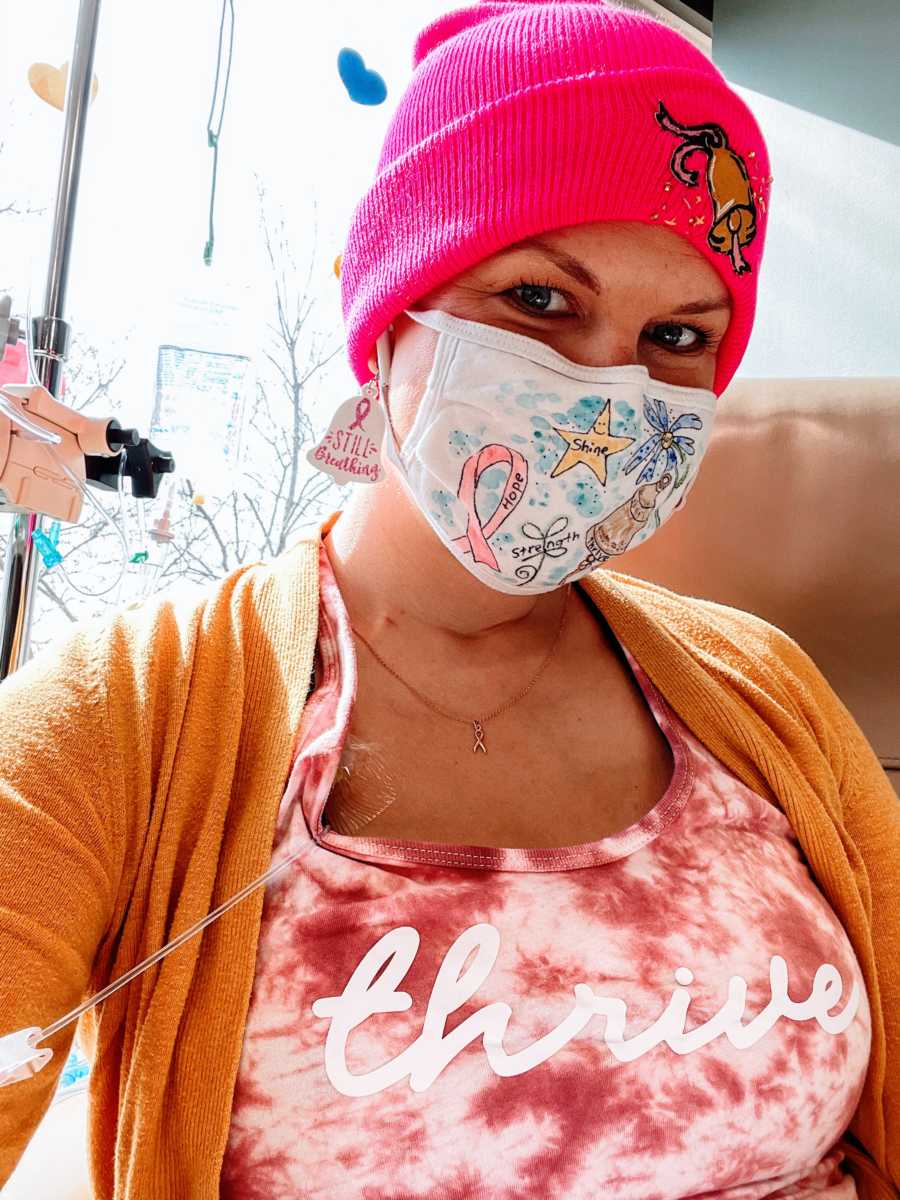 Woman battling breast cancer takes a selfie during chemotherapy