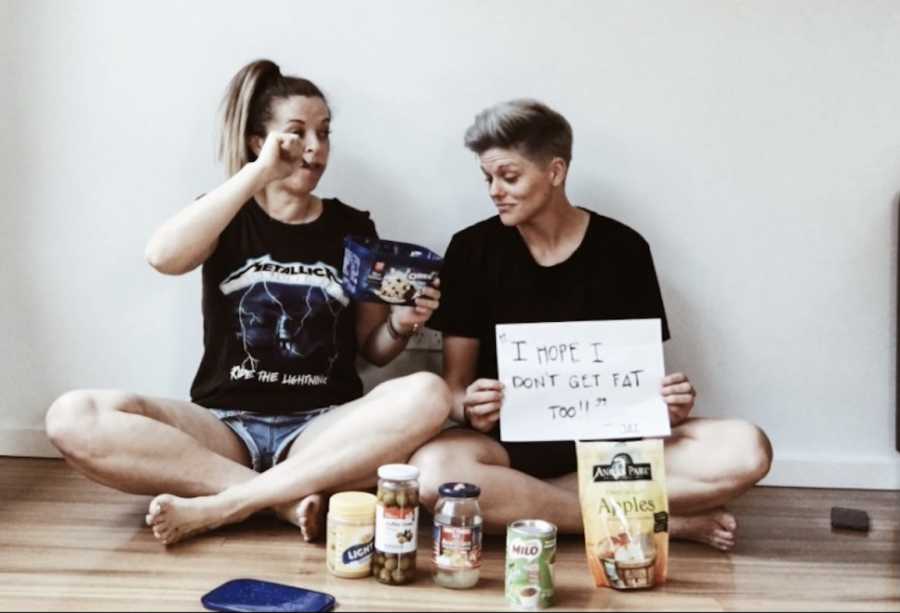 two moms with pregnancy announcement