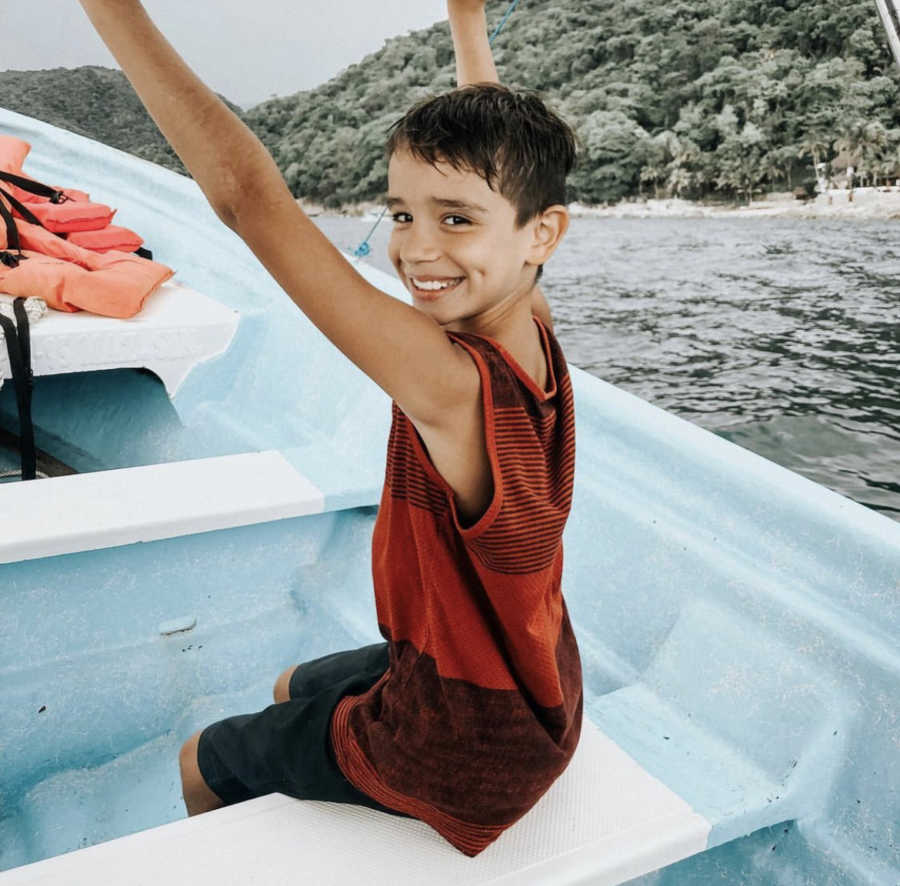 A young boy on a boat