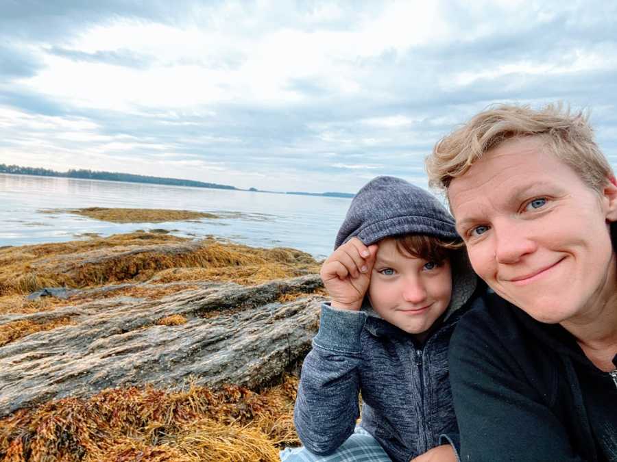 An autistic mom and her son by the sea
