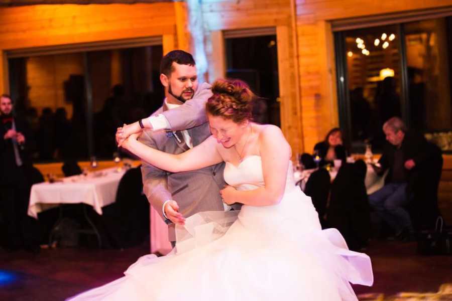 Wedding photo of bride and groom dancing