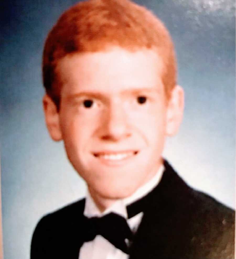 A young man with social anxiety in his high school yearbook photo