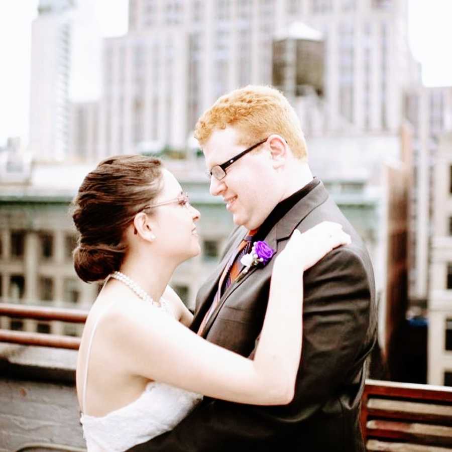 A comedian and his wife dressed in wedding attire getting married