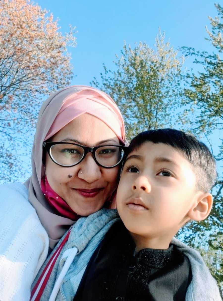 A neurodivergent mom and her son with autism outdoors