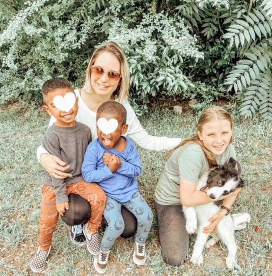 Foster mom takes family photo with adopted daughter and two little boys she's fostering