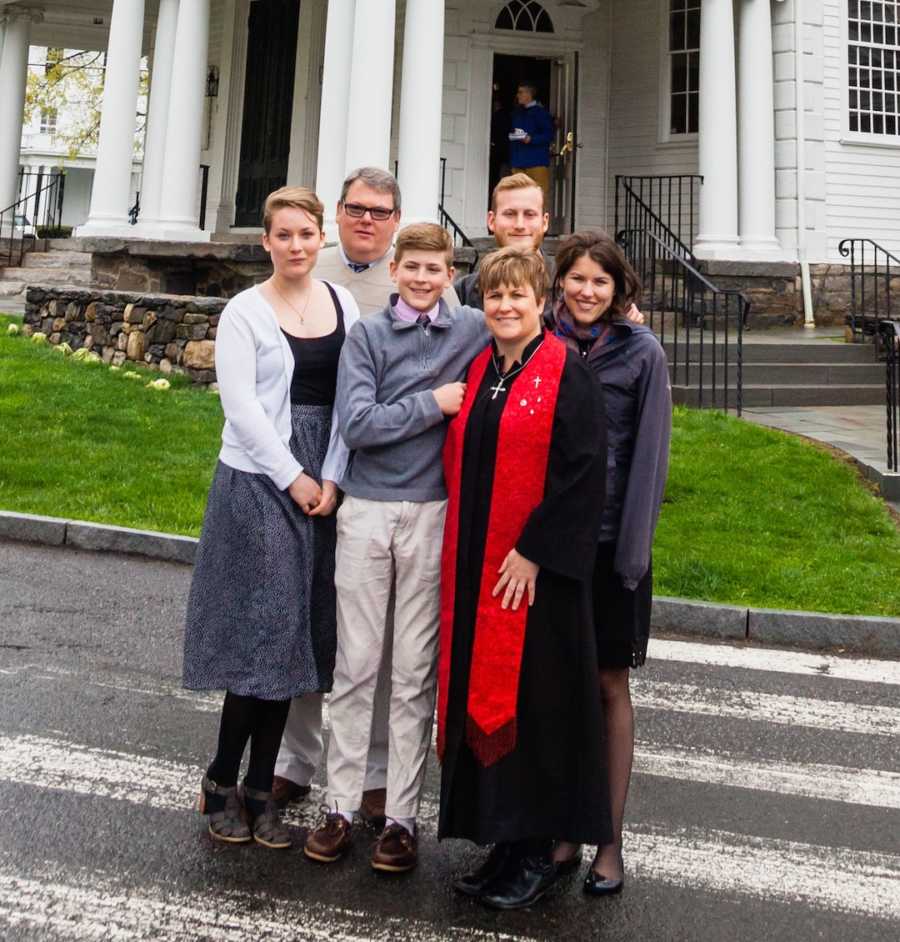 woman with her family outside