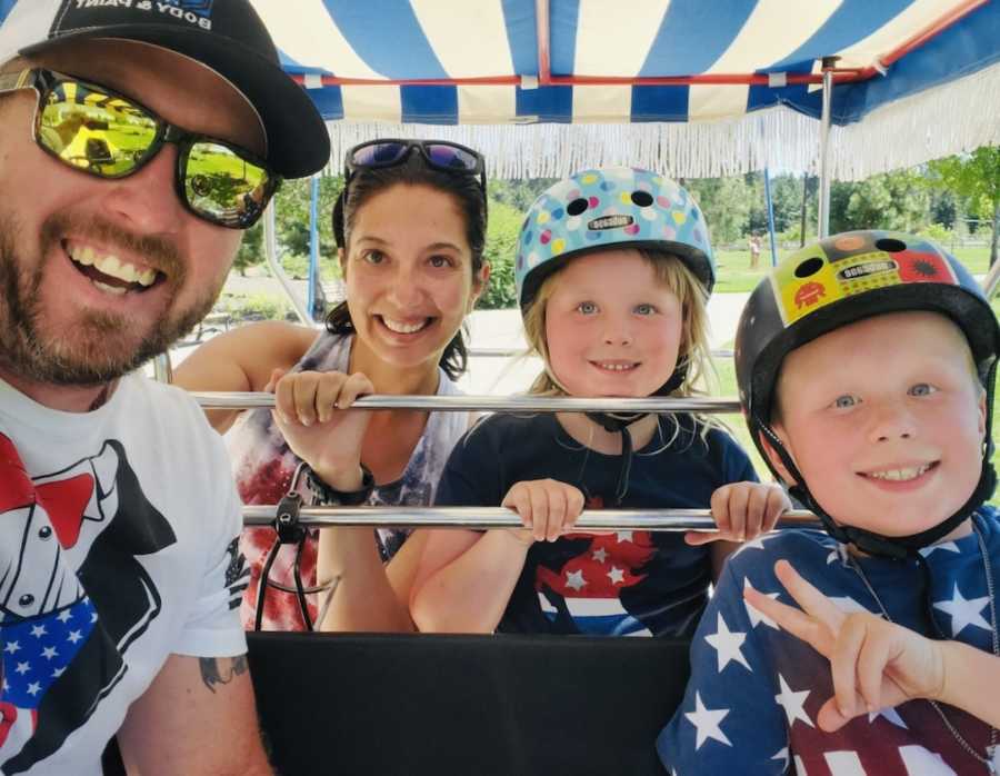 family on amusement park ride