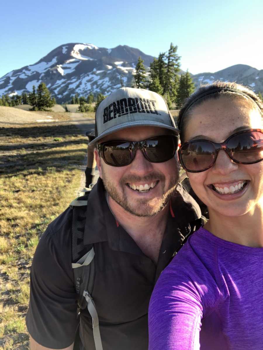 couple posing and smiling together