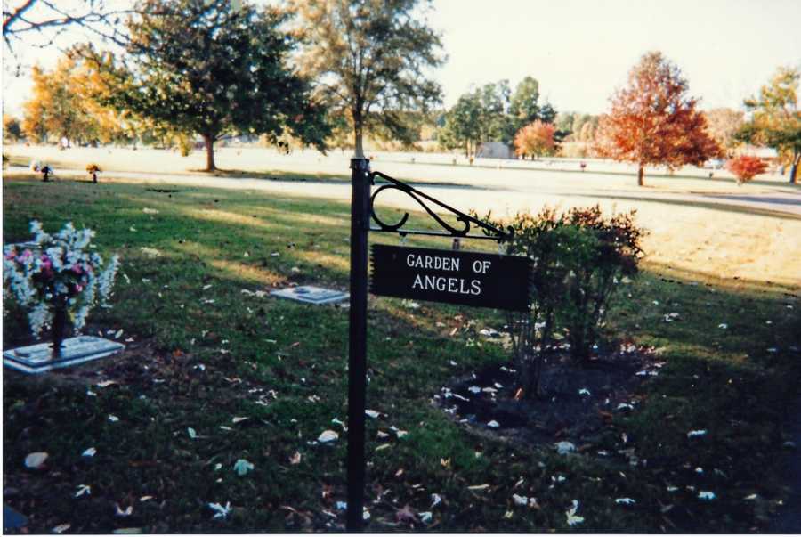 Mom shares photo of a 'Garden of Angels' sign where her first born son is buried