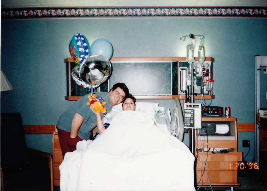 First time parents take photo together in the hospital before wife gives birth