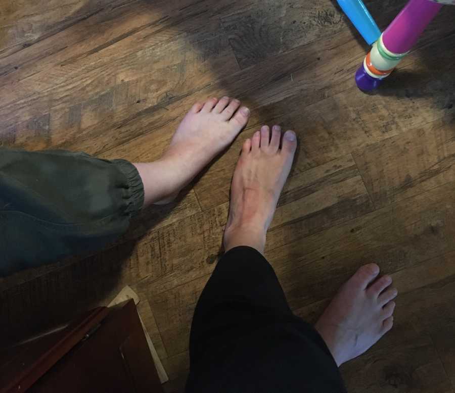 sisters comparing feet
