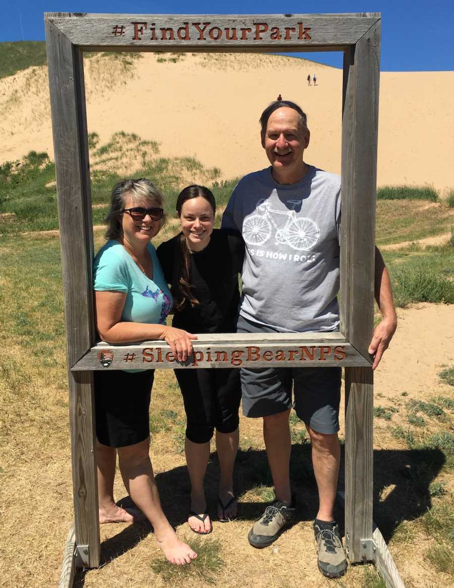 woman with parents at park