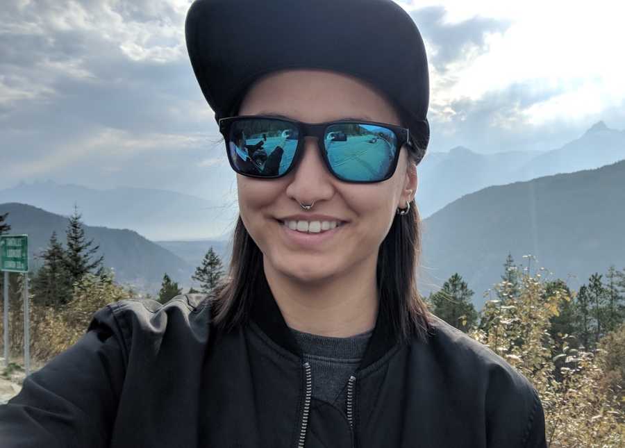 woman smiling on mountains