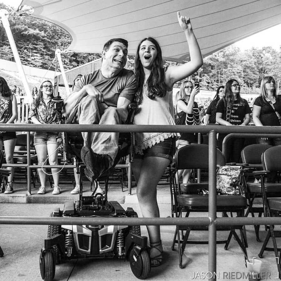 girl and father at a show