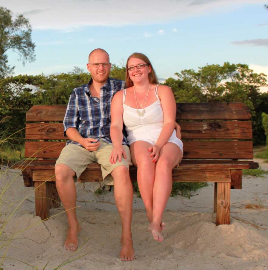 engagement photo of couple on the beach