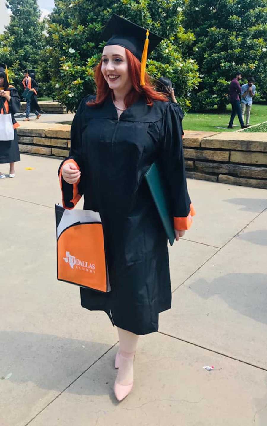 woman in graduation cap and gown