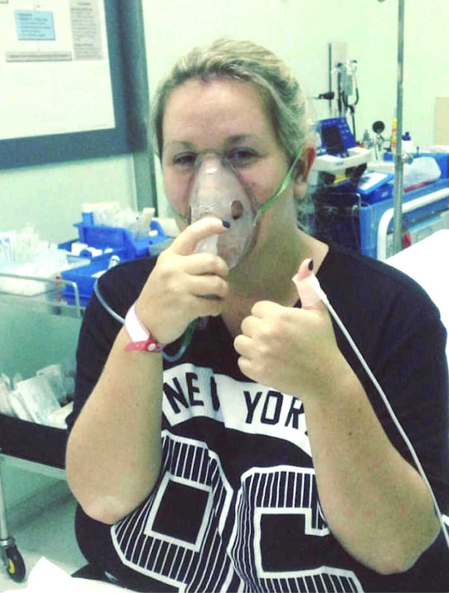 girl wearing oxygen mask