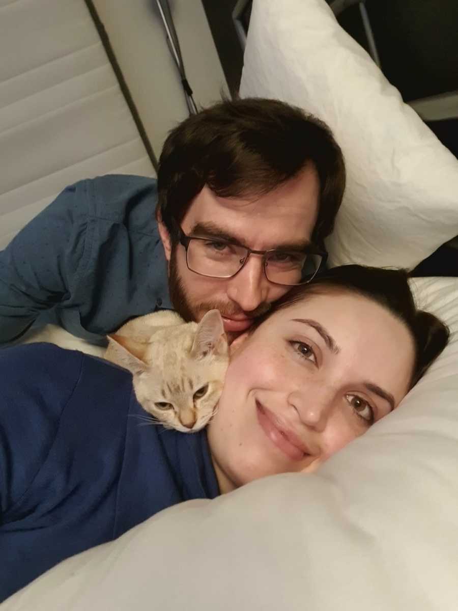 woman with her fiance and cat