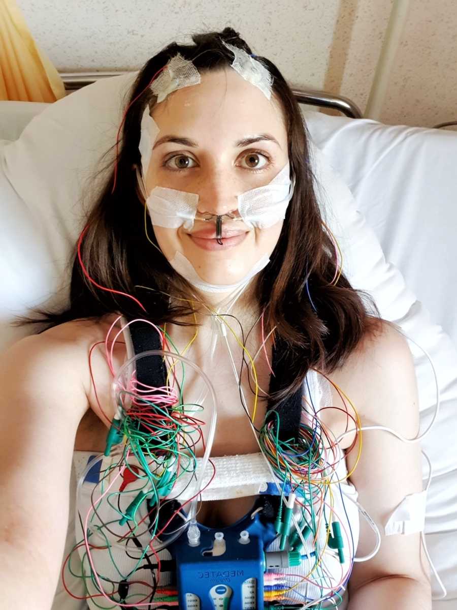 woman in hospital connected to wires