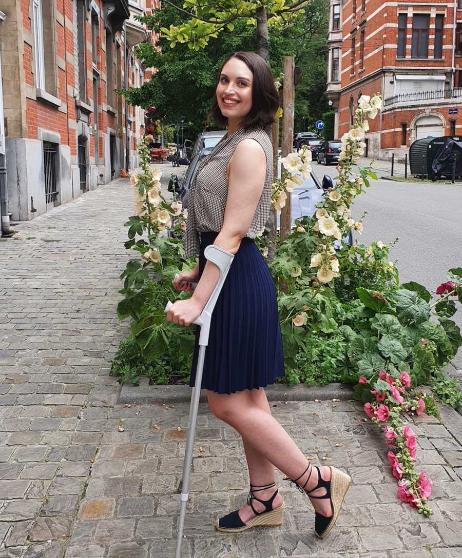 woman with arm crutches