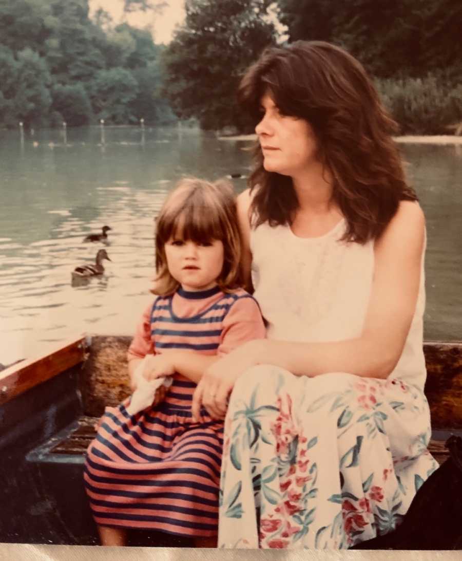 mom and young daughter in a boat