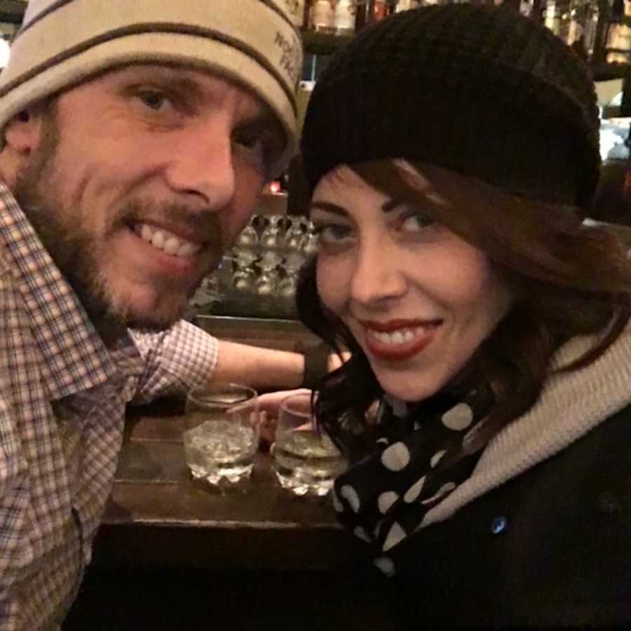 couple drinking and smiling