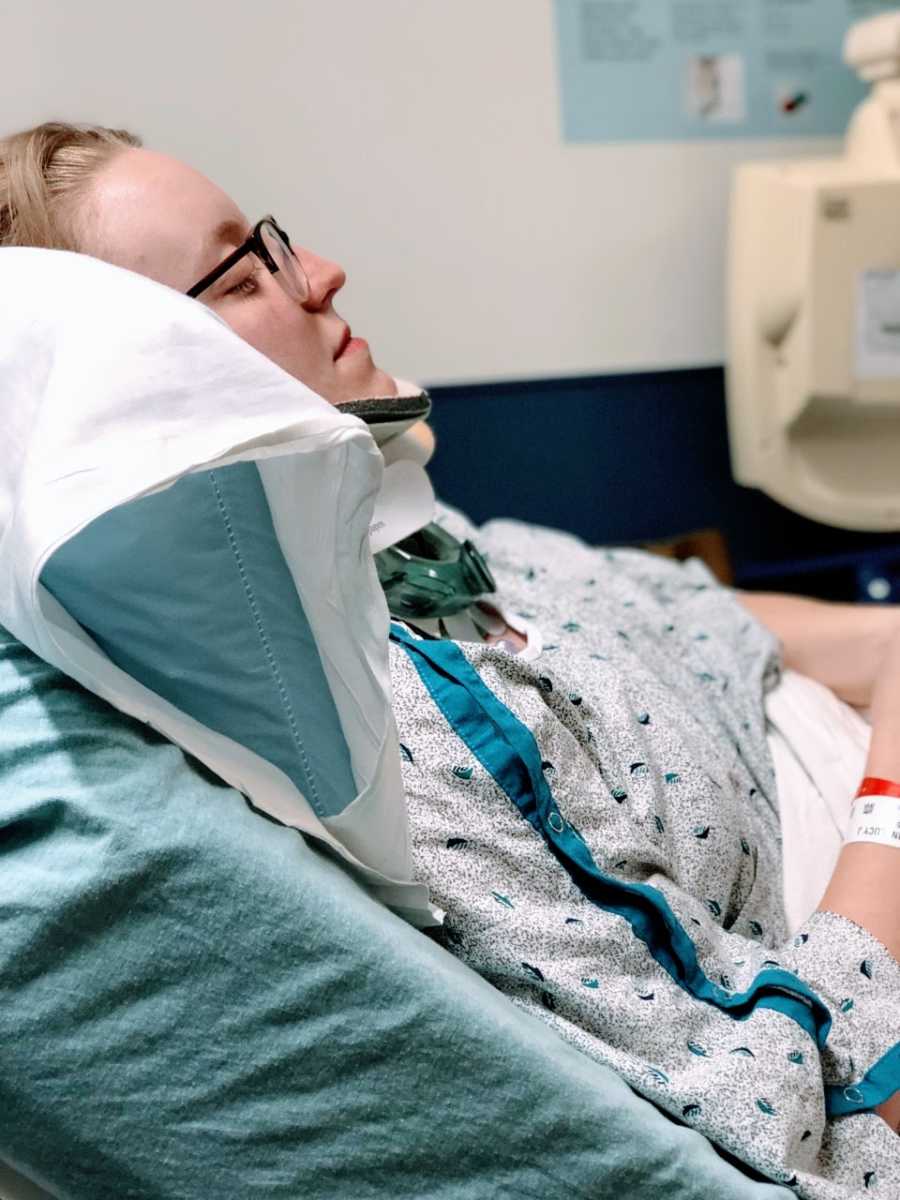 College student recently diagnosed with POTS and EDS lays in hospital bed for surgery