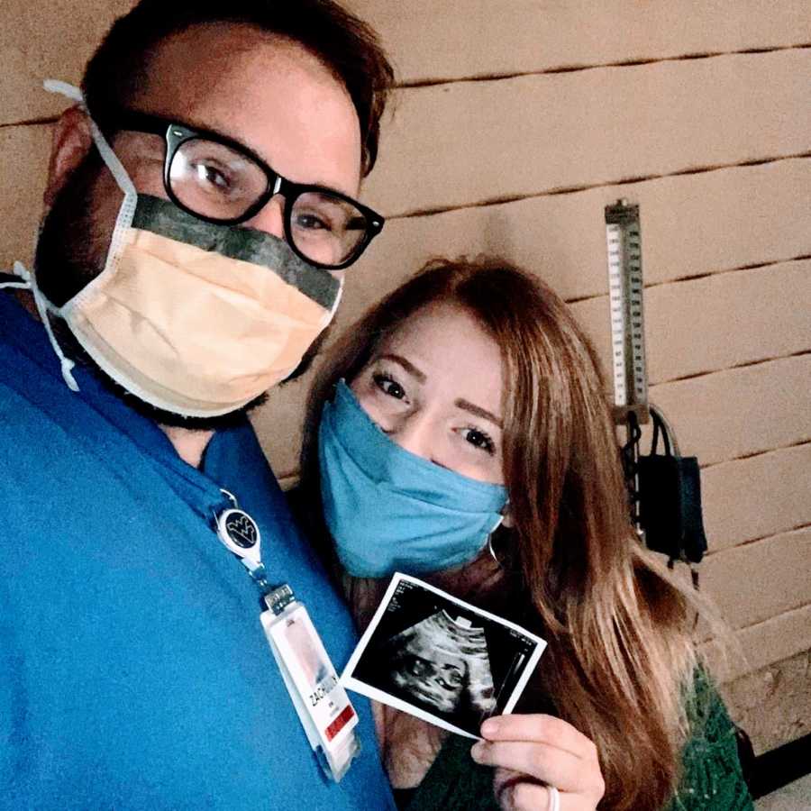 Couple take selfie with sonogram photo of their daughter