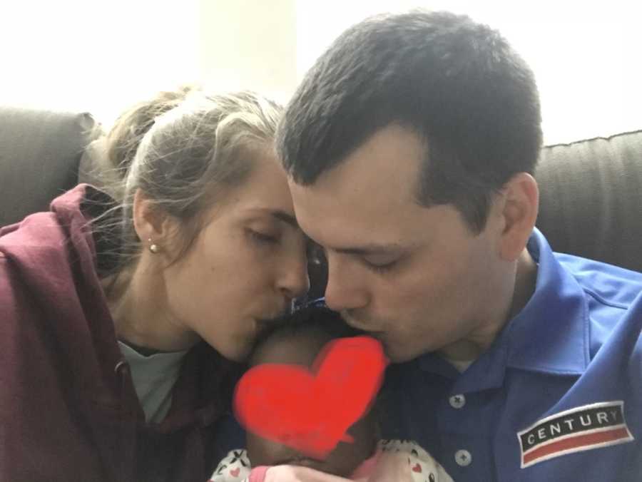 couple with their foster baby