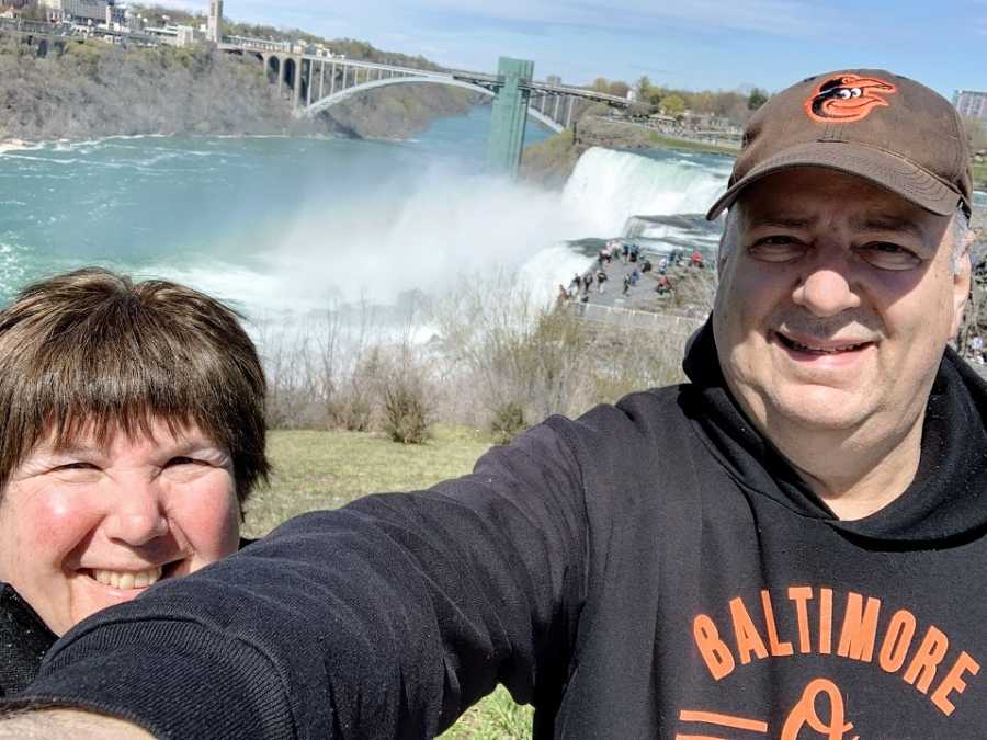 A husband and wife together at Niagara Falls