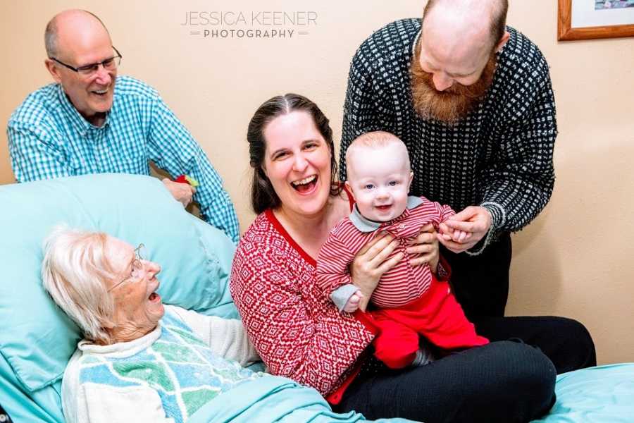 A couple visit relatives with their baby