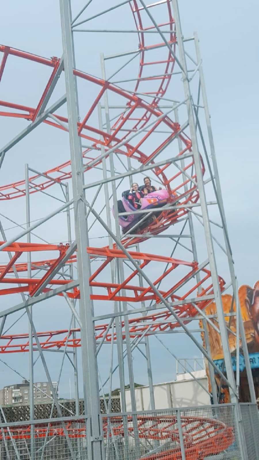 A woman and her mother on a roller coaster