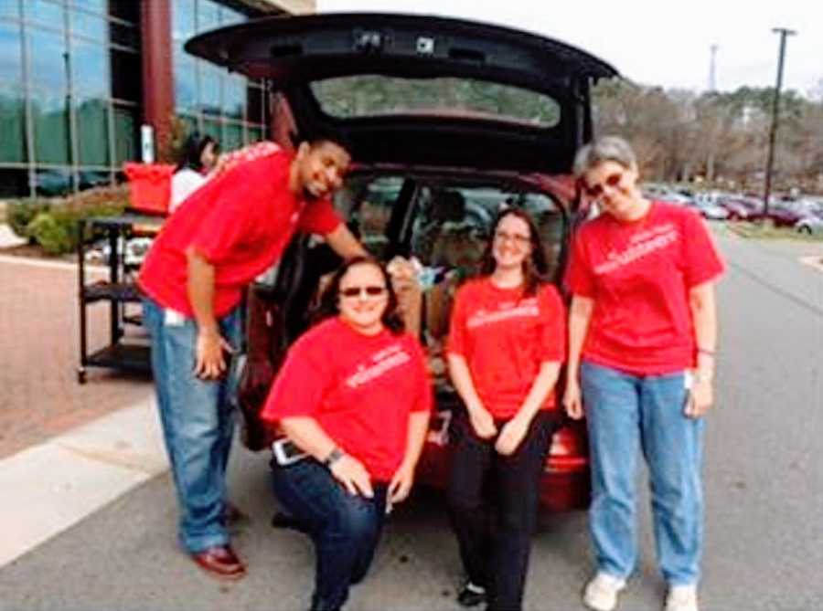 A stroke survivor stands with members of her support group