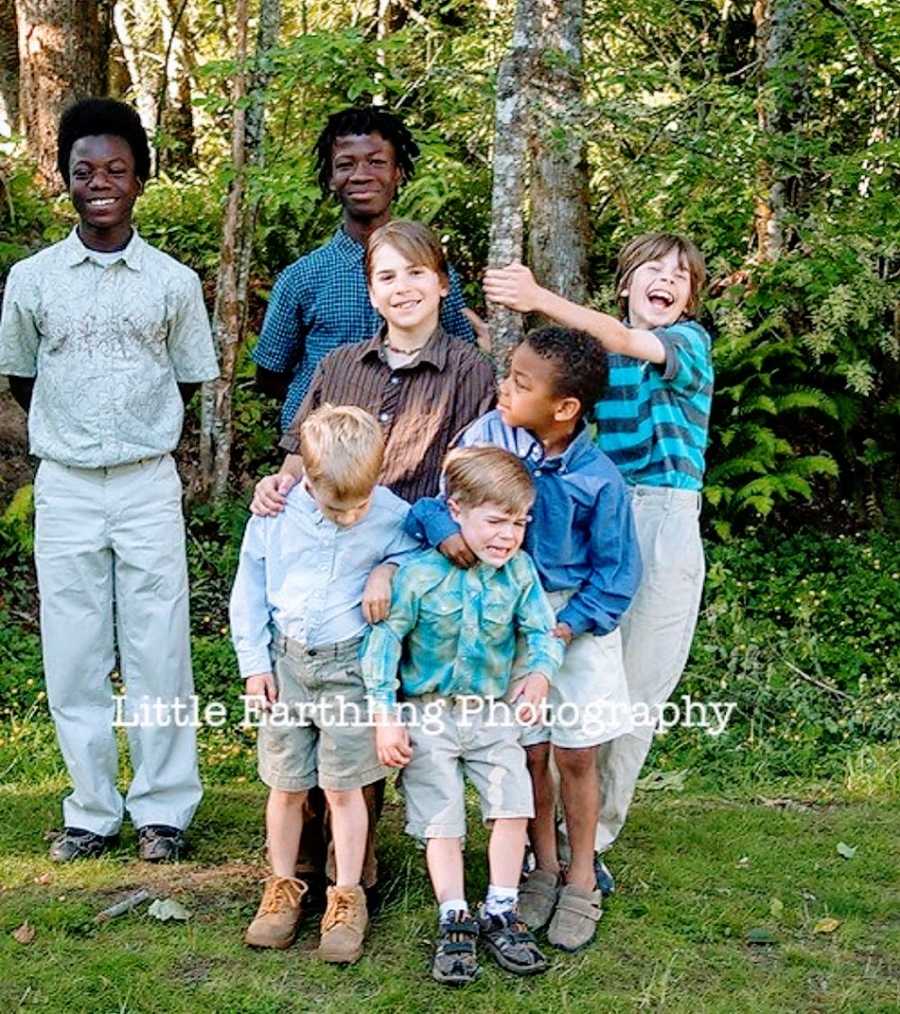 Seven brothers stand together for a photo