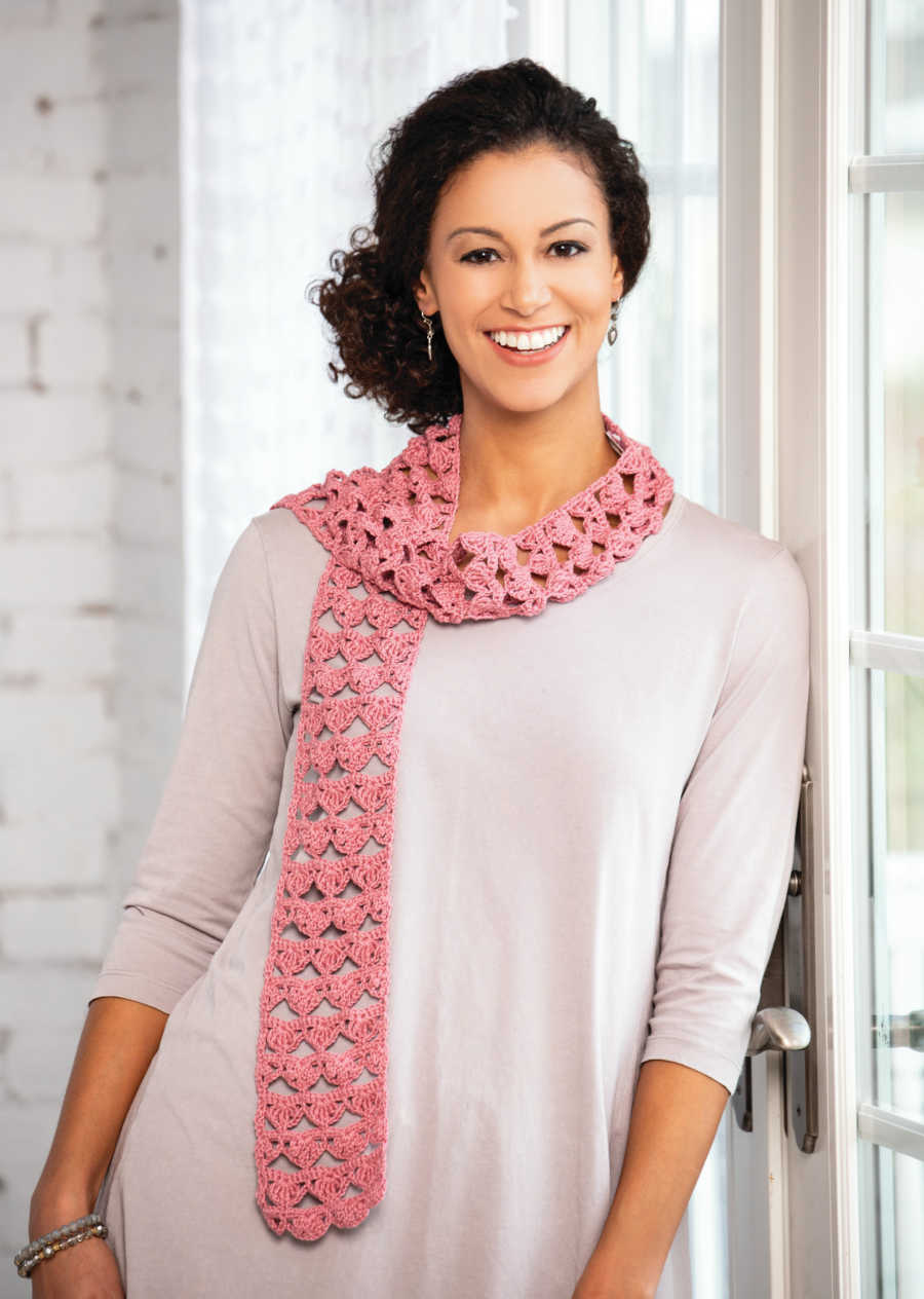 woman wearing pink, handmade scarf