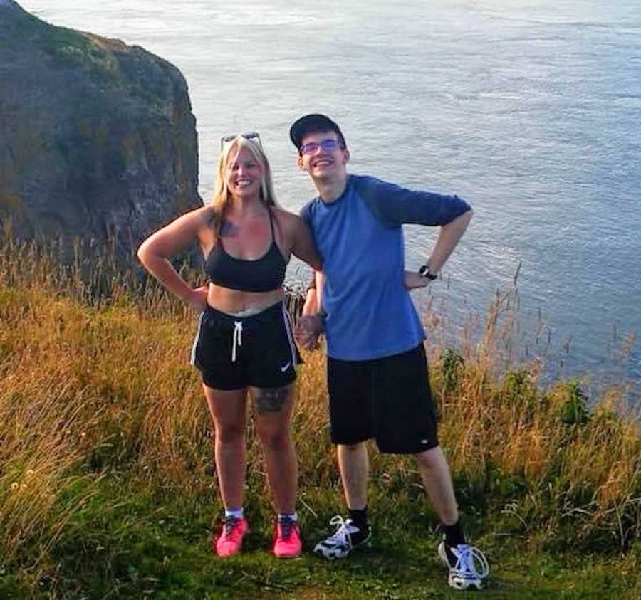 two people hiking, woman with ileostomy bag