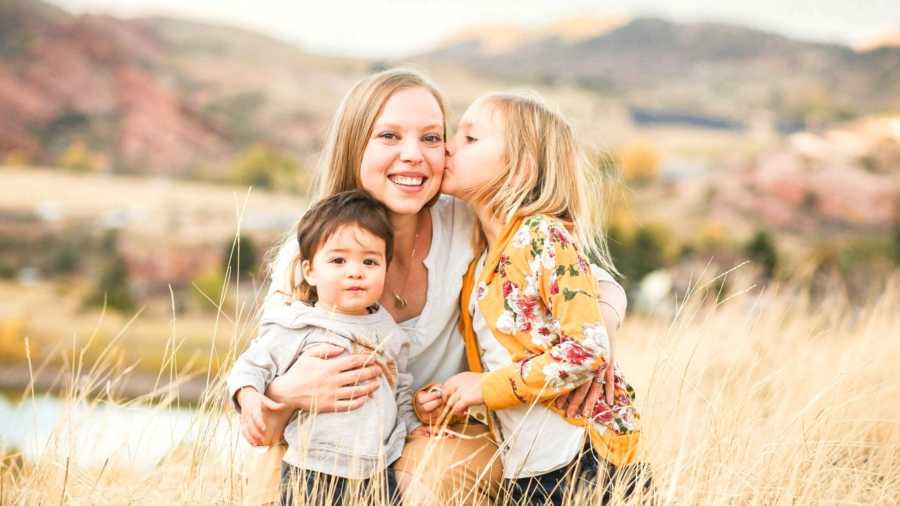 mom, outside with two children