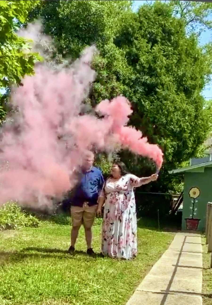 Young couple trying to conceive after multiple miscarriages reveal the gender of their rainbow baby with pink smoke