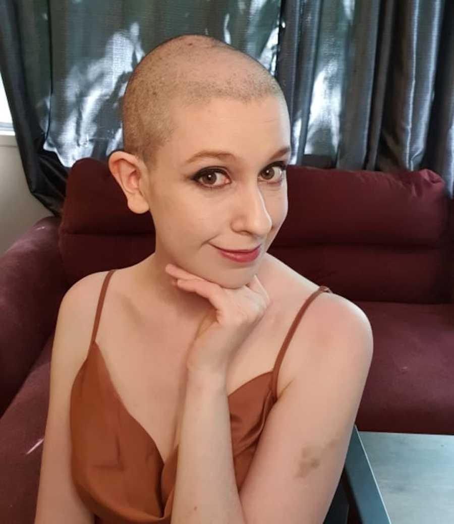 bald woman smiling