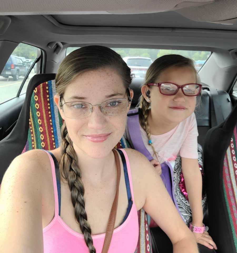 mom and daughter in the car