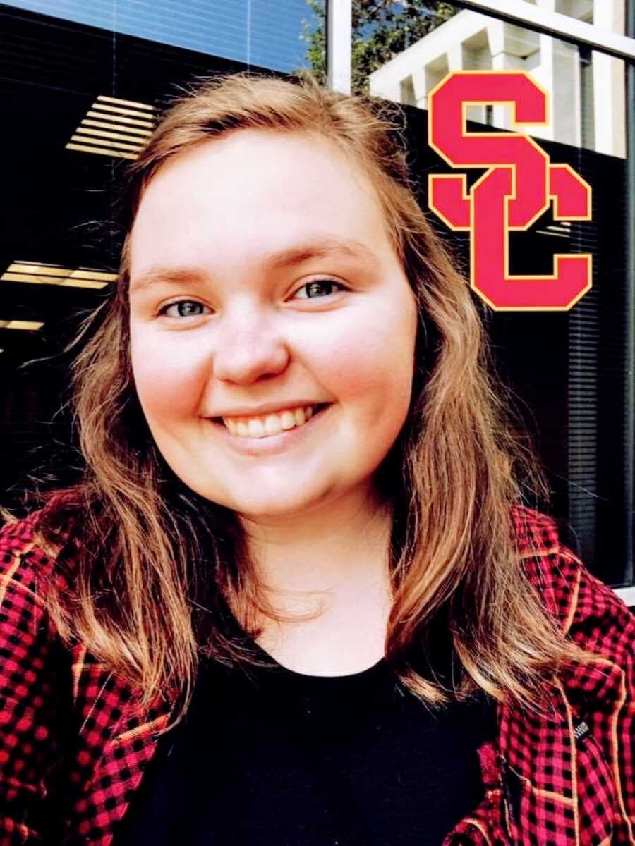 Young college student takes a selfie with a University of Southern California filter