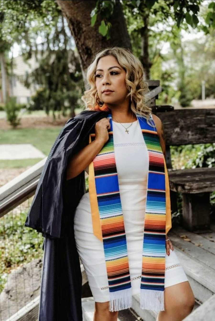 First generation college student takes graduation pictures at Sonoma State University