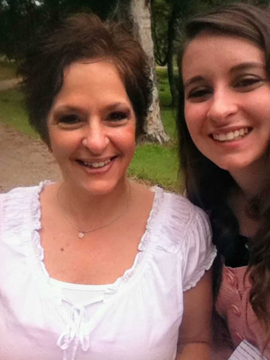 mom and daughter smiling